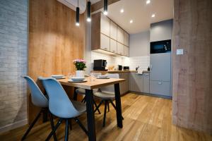 Kuchyň nebo kuchyňský kout v ubytování Laguna Beskidów Resort - Apartament B33