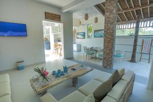 TV a/nebo společenská místnost v ubytování Island Style Retreat