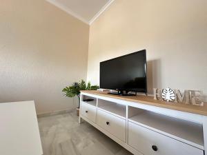 TV a/nebo společenská místnost v ubytování La Almadraba segunda Pista