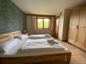 Ένα ή περισσότερα κρεβάτια σε δωμάτιο στο Ferienhaus "Antonia"