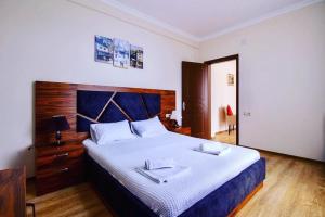 Postel nebo postele na pokoji v ubytování Golden Fleece Hotel
