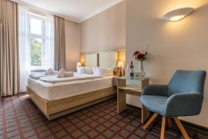Postel nebo postele na pokoji v ubytování Hotel Polar-Stern