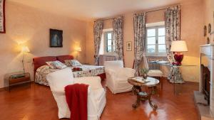 a bedroom with a bed and a living room at CASA DEL DUCA 10, Emma Villas in Portoferraio +38 photos