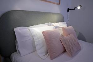 Postel nebo postele na pokoji v ubytování Lacass Apartment