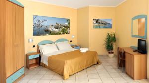 Postel nebo postele na pokoji v ubytování Hotel Alizé + 27 fotografií