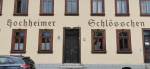 a building with a door and some windows at Pension Hochheimer Schlösschen in Erfurt