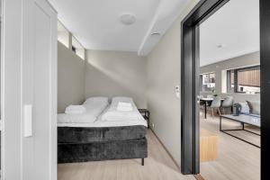 Ένα ή περισσότερα κρεβάτια σε δωμάτιο στο Villa Nansen - Ny Eksklusiv Villa