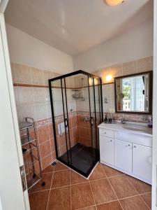 a bathroom with a shower and a sink at VİLLA MARMARİS in Marmaris +27 photos