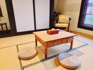 Istumisnurk majutusasutuses 來珈宿囍 眷村民宿