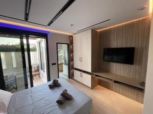Voodi või voodid majutusasutuse Poseidon Beach Hotel toas