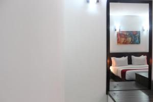 Postel nebo postele na pokoji v ubytování Hotel Belle Vie