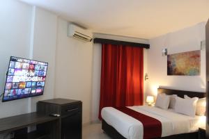 Postel nebo postele na pokoji v ubytování Hotel Belle Vie