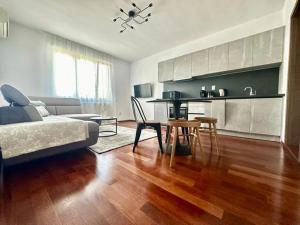 a living room with a couch and a table at House Pica in Cluj-Napoca
