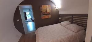 Postel nebo postele na pokoji v ubytování Gite des remparts + 40 fotografií