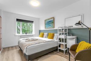 Postel nebo postele na pokoji v ubytování Flóki by Guesthouse Reykjavík