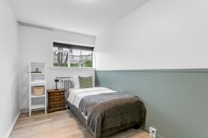 Postel nebo postele na pokoji v ubytování Flóki by Guesthouse Reykjavík