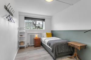 Postel nebo postele na pokoji v ubytování Flóki by Guesthouse Reykjavík