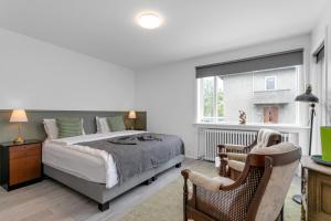 Postel nebo postele na pokoji v ubytování Flóki by Guesthouse Reykjavík