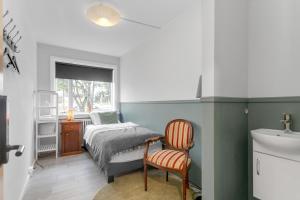 Postel nebo postele na pokoji v ubytování Flóki by Guesthouse Reykjavík
