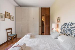 Cama o camas de una habitación en Casa Martina, Piazza Delle Erbe, San Gimignano