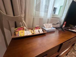 TV a/nebo společenská místnost v ubytování Kapitan Kongsi Boutique Hotel