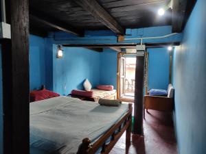 Postel nebo postele na pokoji v ubytování Kriti Home and Accomodation