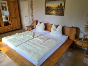 Postel nebo postele na pokoji v ubytování Ferienhaus Saupe