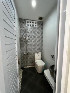 Koupelna v ubytování Sabbi's House