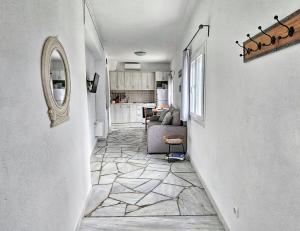 Kuchyň nebo kuchyňský kout v ubytování Tinoshomelidays Residences