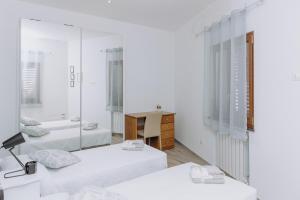 Letto o letti in una camera di Modianus Suite