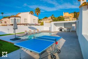 Stolní tenis v ubytování Villa Mango by Abahana Villas nebo okolí