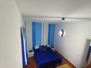 Postel nebo postele na pokoji v ubytování Giudilu'