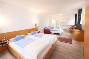 Postel nebo postele na pokoji v ubytování Zur Alten Post