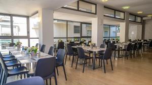 Hotel Eiffel tesisinde bir restoran veya yemek mekanı