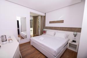 Postel nebo postele na pokoji v ubytování Prestige Resort