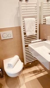 Koupelna v ubytování GuestHouse Große Linde