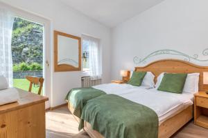 Posteľ alebo postele v izbe v ubytovaní Albergo Alla Costa + 18 fotografií