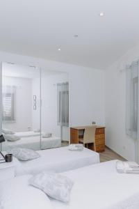 Letto o letti in una camera di Modianus Suite