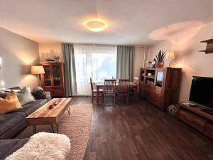 Televisyen dan/atau pusat hiburan di Sky & Sand SPO Dünenkind I Top Lage am Strand, Boxspringbett, Sonnenloggia