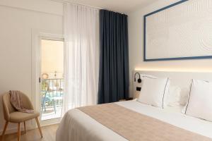 Postel nebo postele na pokoji v ubytování Hotel Rovira
