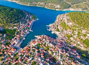 an aerial view of a city next to a river at Baskotin in Pučišća