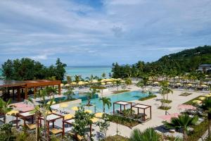 een luchtzicht op een resort met een zwembad bij Canopy By Hilton Seychelles Resort in Anse a La Mouche