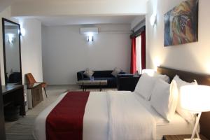 Postel nebo postele na pokoji v ubytování Hotel Belle Vie