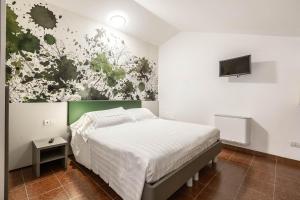 Postel nebo postele na pokoji v ubytování Casa Rita