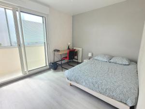 Postel nebo postele na pokoji v ubytování Appartement T4