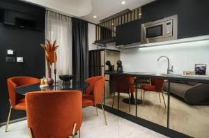Kuchyň nebo kuchyňský kout v ubytování Apartments Antonia
