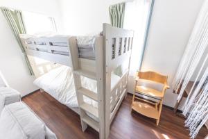 Postel nebo postele na pokoji v ubytování TRIP PERCH 30m2 最大5名 上北沢駅から徒歩6分 新宿から直通 デザイナー監修