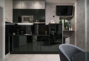 TV a/nebo společenská místnost v ubytování Apartments Antonia