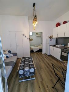 Kuchyňa alebo kuchynka v ubytovaní Appartement cosy proche du port