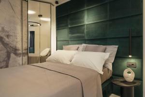 Postel nebo postele na pokoji v ubytování Apartments Antonia